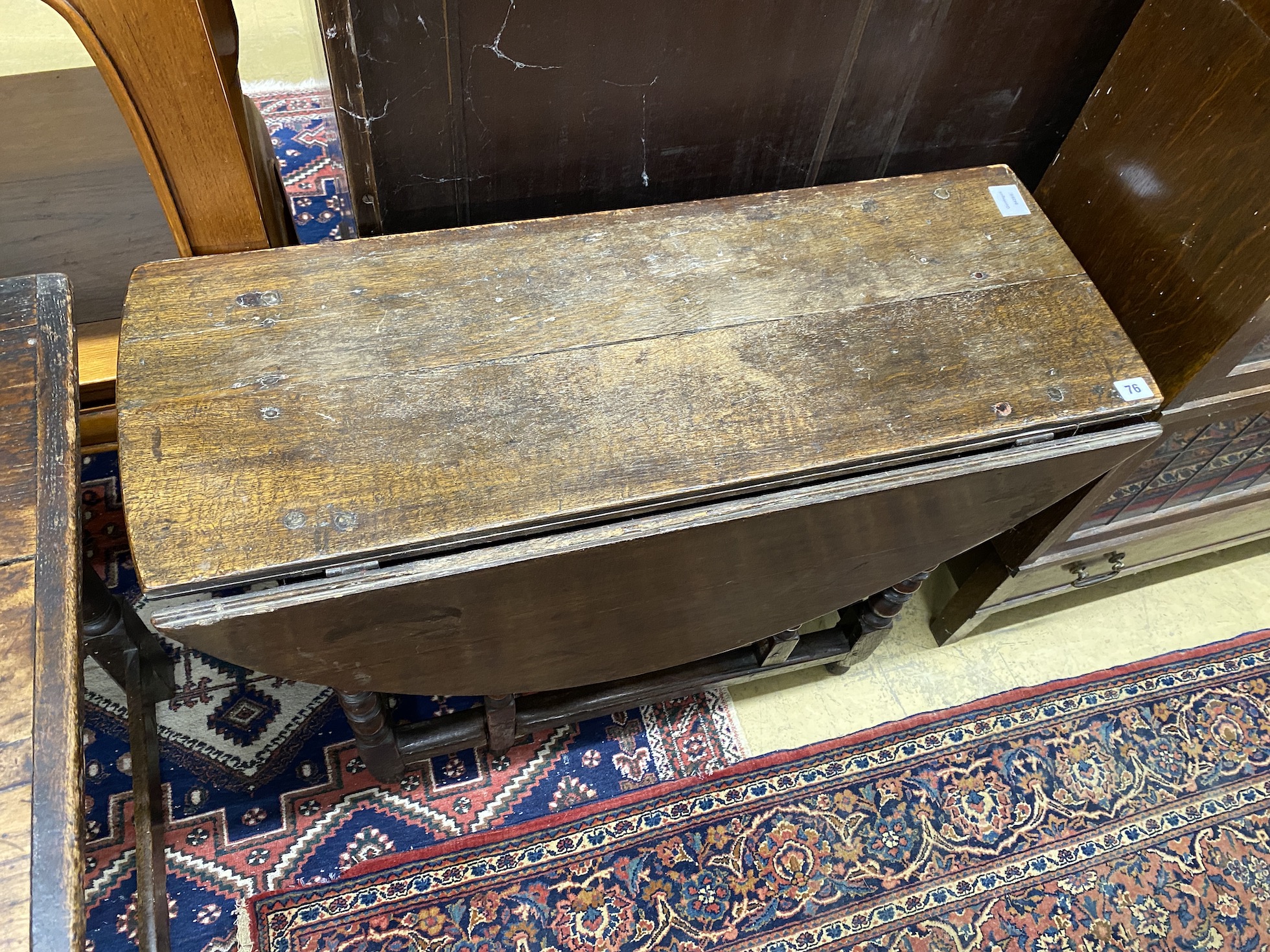 An 18th century oak gateleg table, width 88cm, depth 36cm, height 69cm